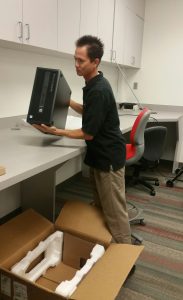David Craig unpacks the new computer for Hunt’s in preparation for the Manager SE installation and data recovery.